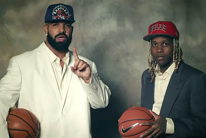 A photo of Chicago Artist Lil Durk and Canadian Artist Drake Holding Basketballs at a Video Shot